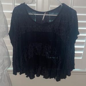 Black top with floral embroidery